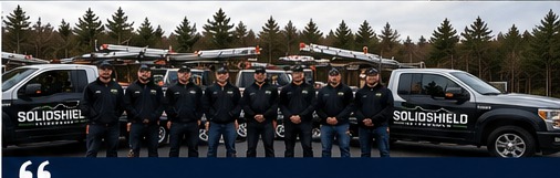 SolidShield team and work trucks